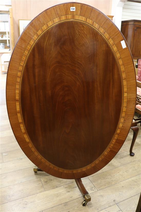 A 19th century inlaid mahogany oval centre table W.99cm